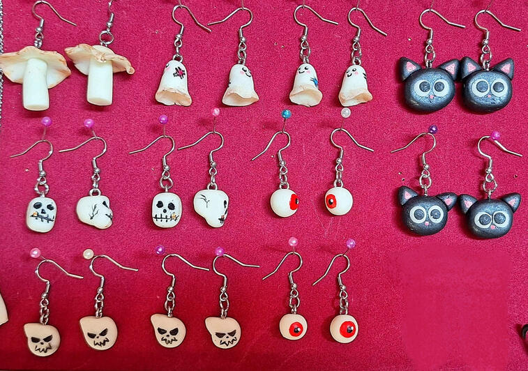 Polymer clay glow-in-the-dark earrings, detailed with acrylic paint