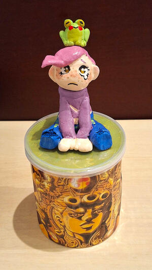 Air-dry clay figure painted with acrylics
